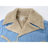 Maverick Jacket Wide notch lapel, arcuate panels, pocket flaps and cuffs shearling accents.