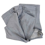 Detail of made in the USA Nouvelle Vague slacks Frogmouth pockets and snap button waistband.